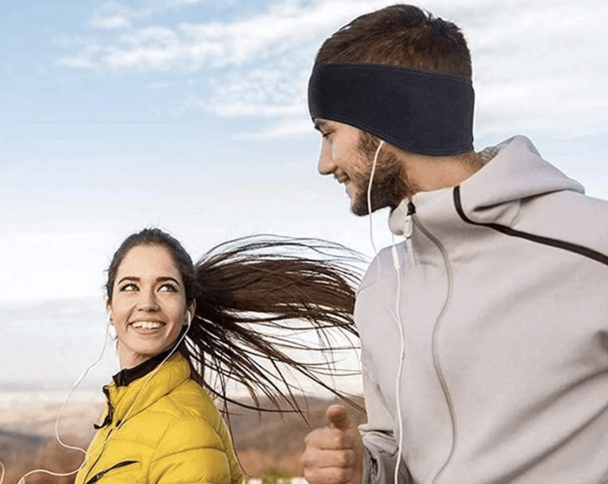 Cover your ears using ear warmers