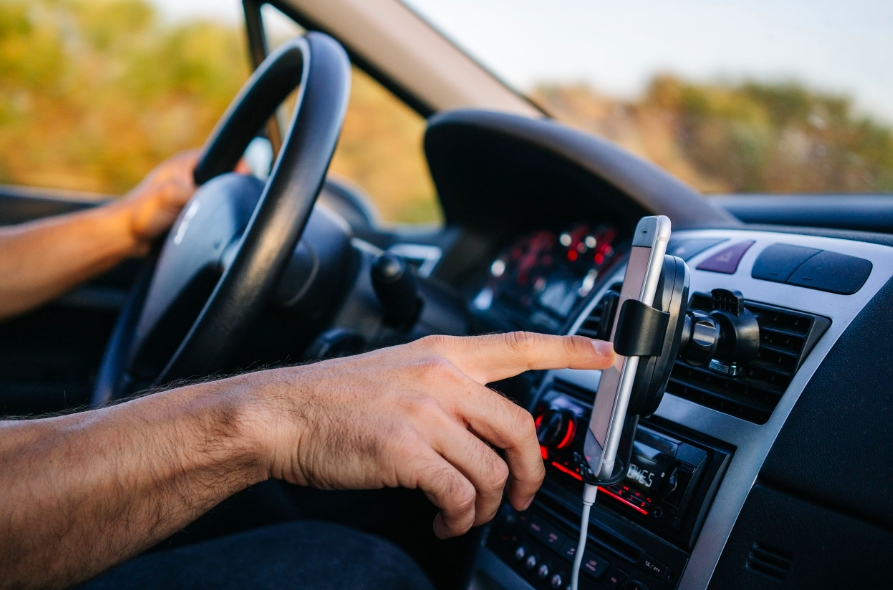  earbuds or headphones while driving